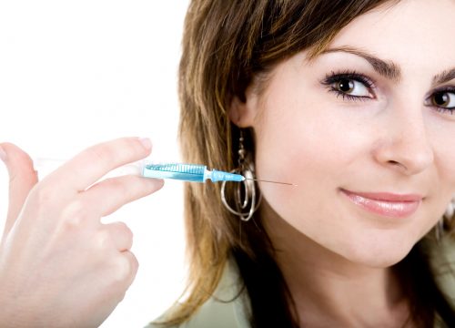 Woman using Botox injections for acne scars