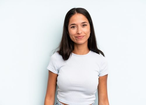 Pretty woman smiling positively and confidently