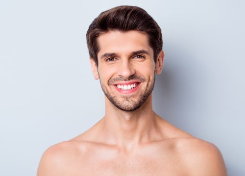 Photo of a smiling, attractive man